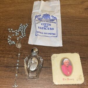 SOLD. Silver Blue Rosary, Holy Water from Vatican City
